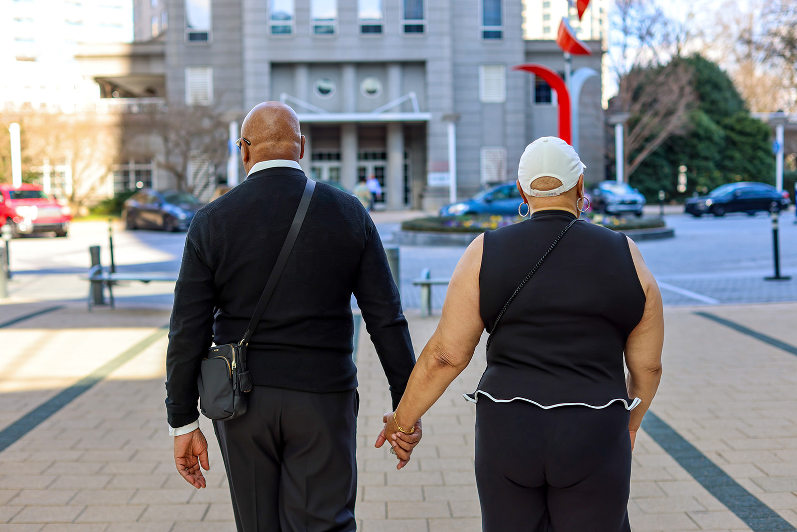 The Johnsons holding hands